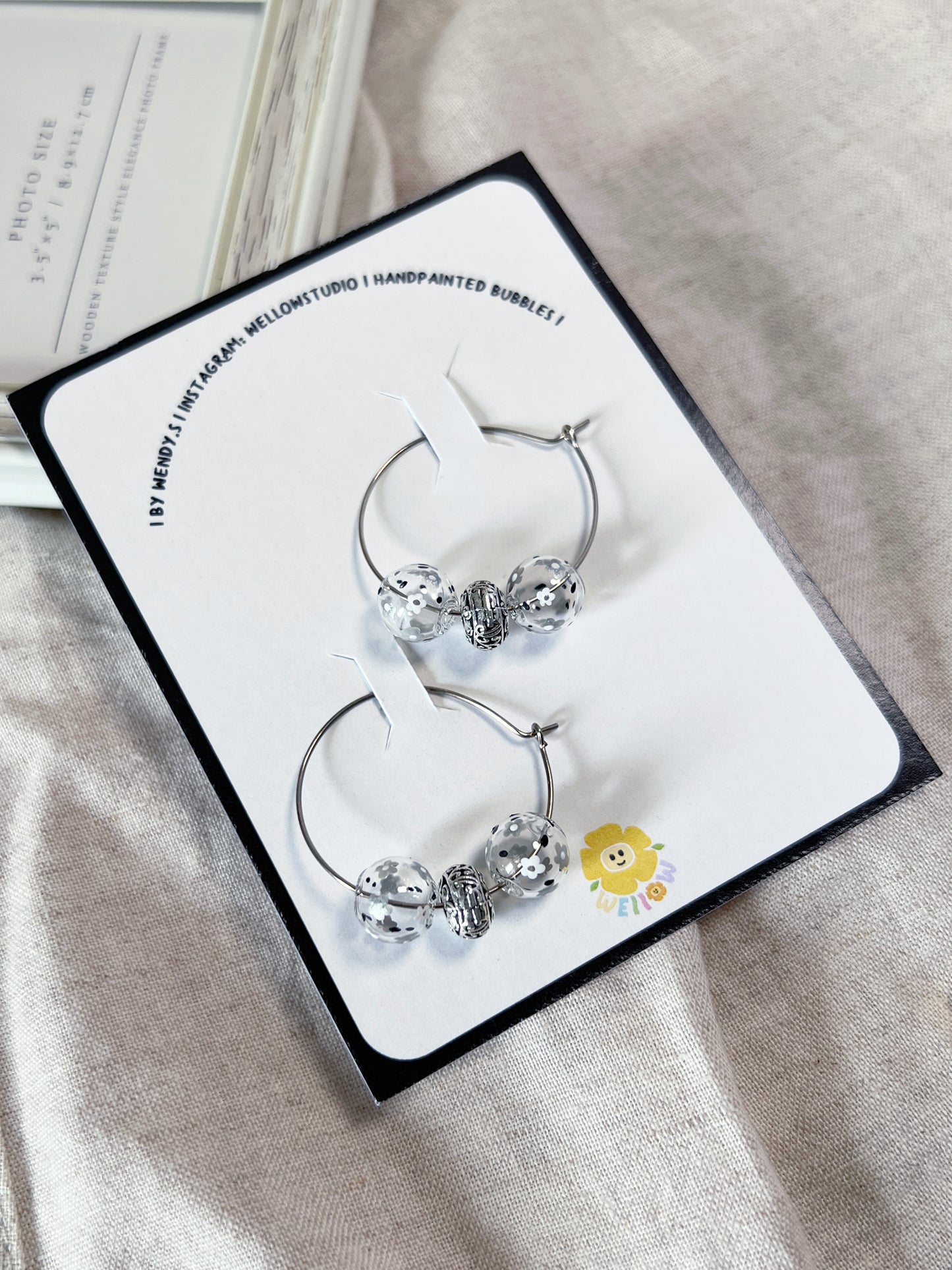 Silver and White Floral Hoops