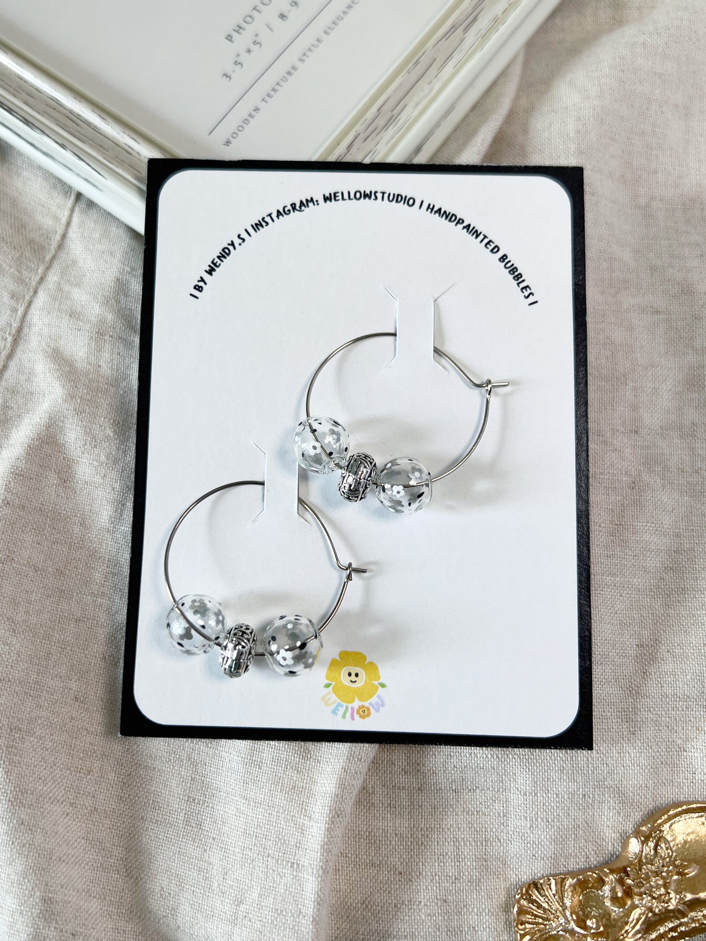 Silver and White Floral Hoops